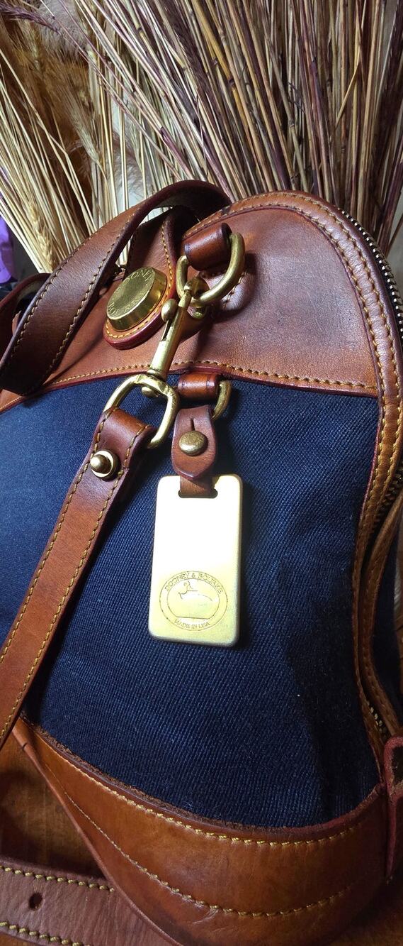 VINTAGE DOONEY & BOURKE CABRIOLET W/PATINA
